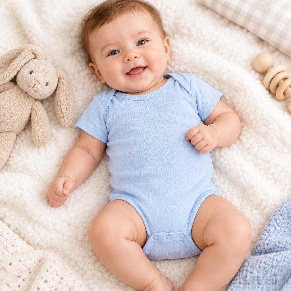 Sky blue cotton baby bodysuit with envelope neck and leg poppers