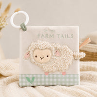 On The Farm soft crinkle baby book featuring Lottie the Lamb a touchy feely tactile sheep on the cover. Clip to attach to the pram