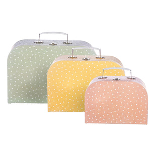 front view of earth tones spotted cardboard suitcase set nursery storage
