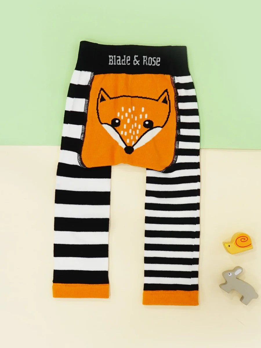 Black and white striped leggings with a orange fox on the bum