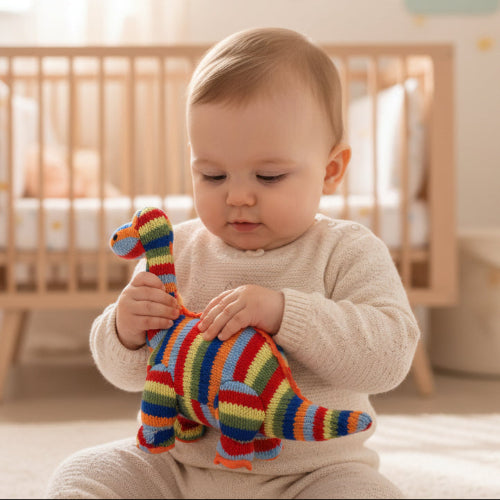 Rainbow Striped Knitted Diplodocus Dinosaur Rattle - Recycled Rattle.