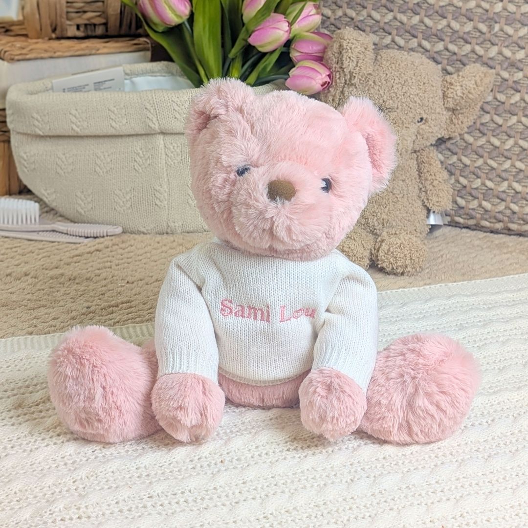 Pink teddy bear with a jumper and personalisation