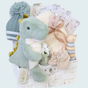 Luxury baby boy gifts hamper featuring a soft T-Rex plush toy and presents packed in a gift basket.