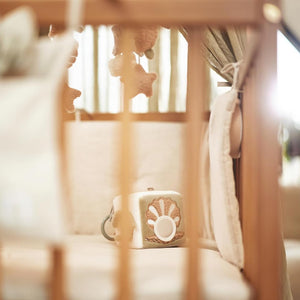 Soft cube toy featuring whale, starfish, and turtle