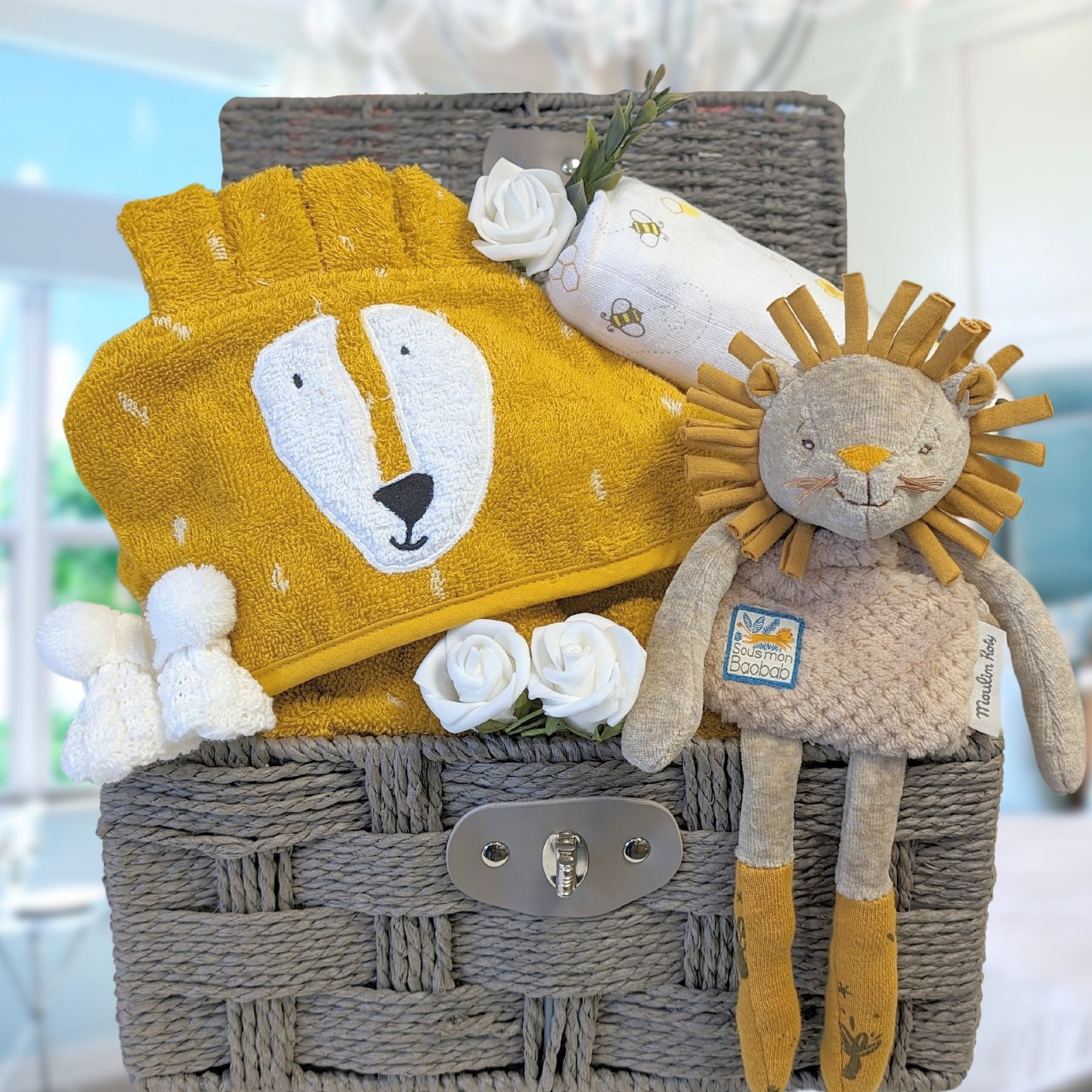 baby gifts hamper with yellow lion dressing gown, lion soft toy and muslin 