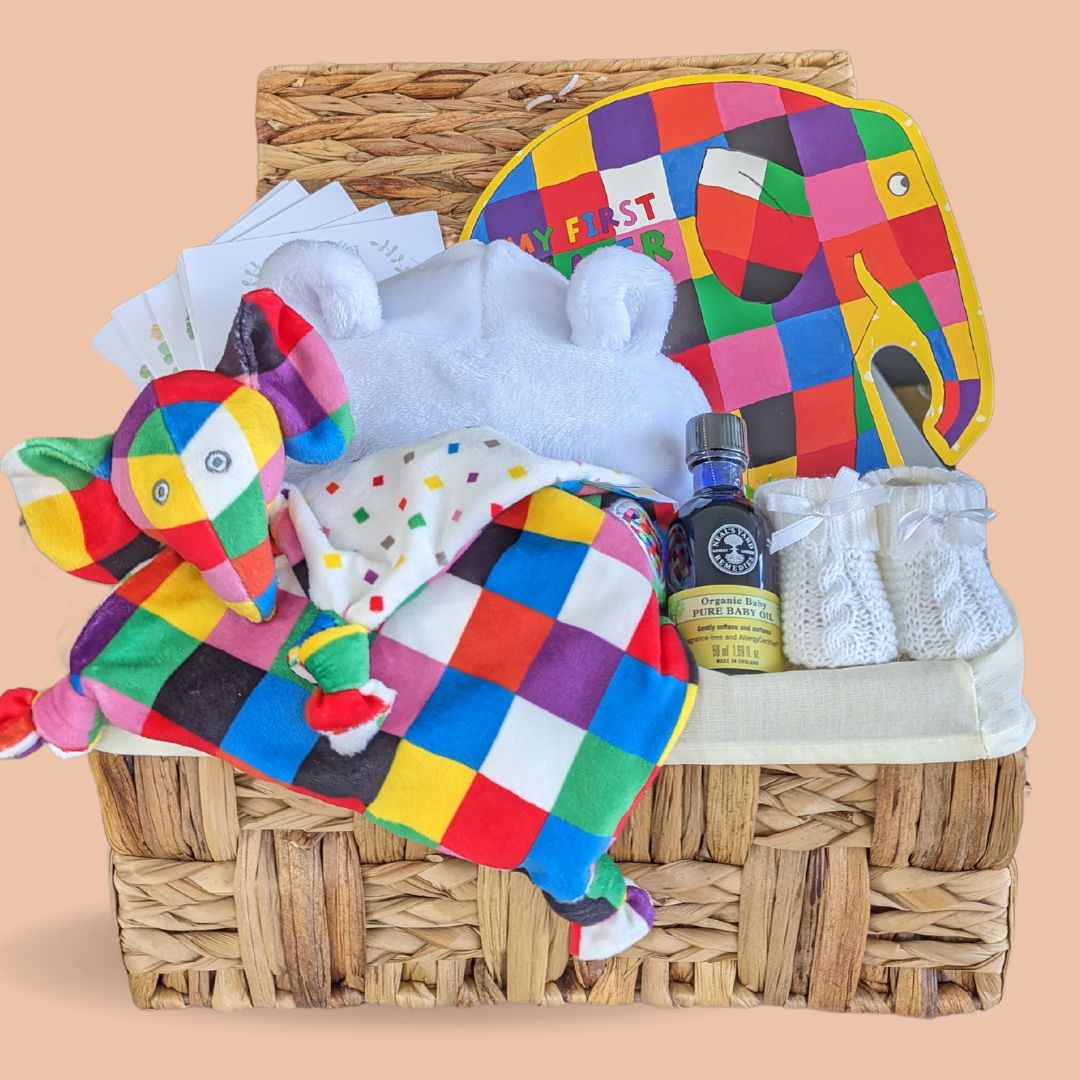 Popular Elmer elephant gift hamper with picture book, soft comforter blankie, hooded baby bathrobe, baby knit booties and beautifully illustrated baby milestone cards.