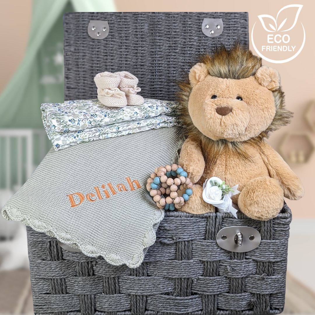 baby gifts hamper with organic blanket and lion theme.