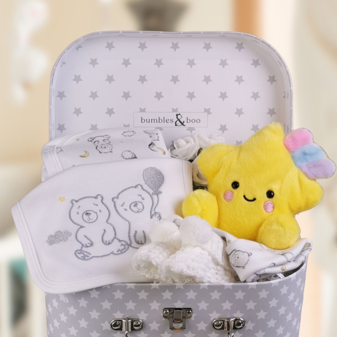 baby gifts hamper with bear and star theme. New baby clothing and yellow star soft toy. 