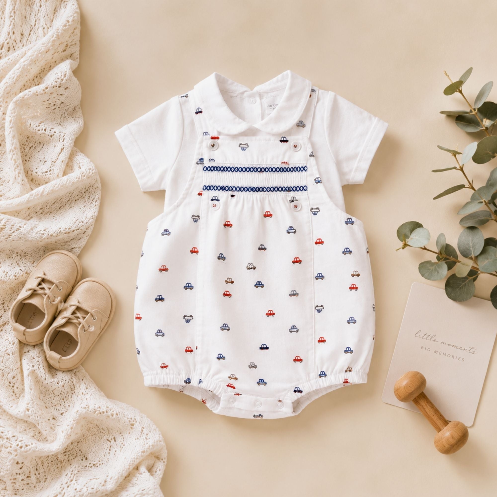 Baby romper with car pattern in white, red and blue