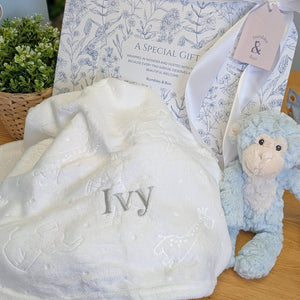 White baby blanket with a personalised name