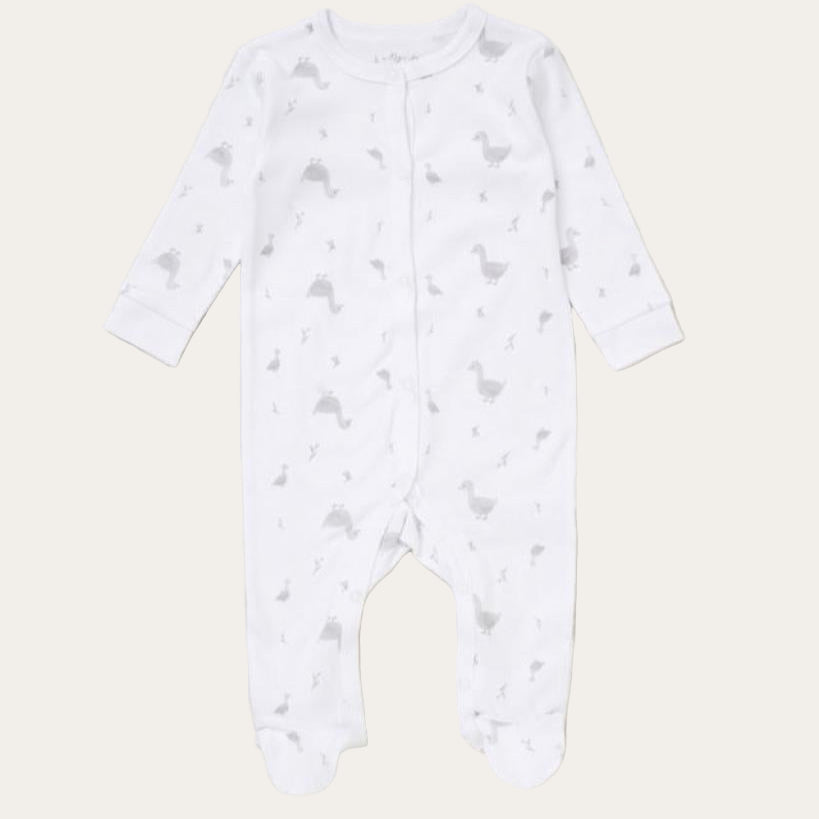 White baby sleepsuit with a grey duck pattern