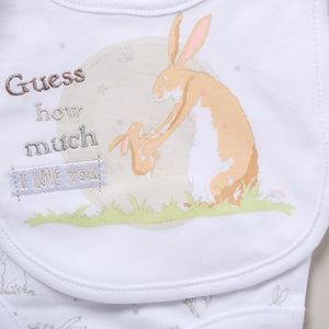 Baby bib with rabbit design and text 'Guess how much I love you' on a white background