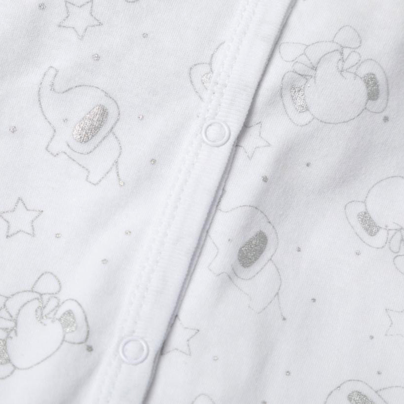 Close-up of cotton sleepsuit with silver elephant print