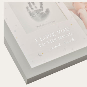 Close-up of the frame’s “I Love You to the Moon and Back” lettering.