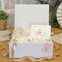 A white magnetic hamper box with shredding. Empty box.