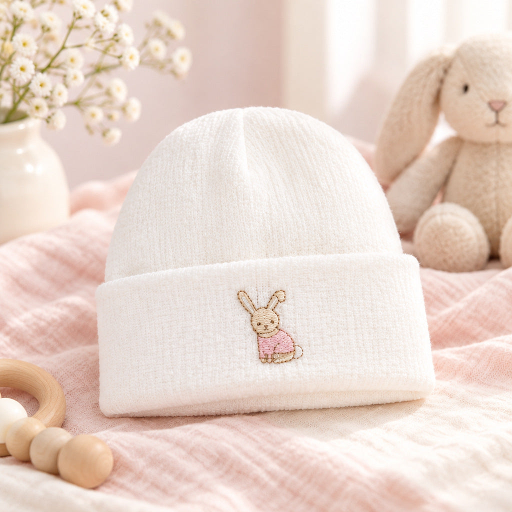 White and pink knitted baby hat with rabbit embroidery for 0-3 months