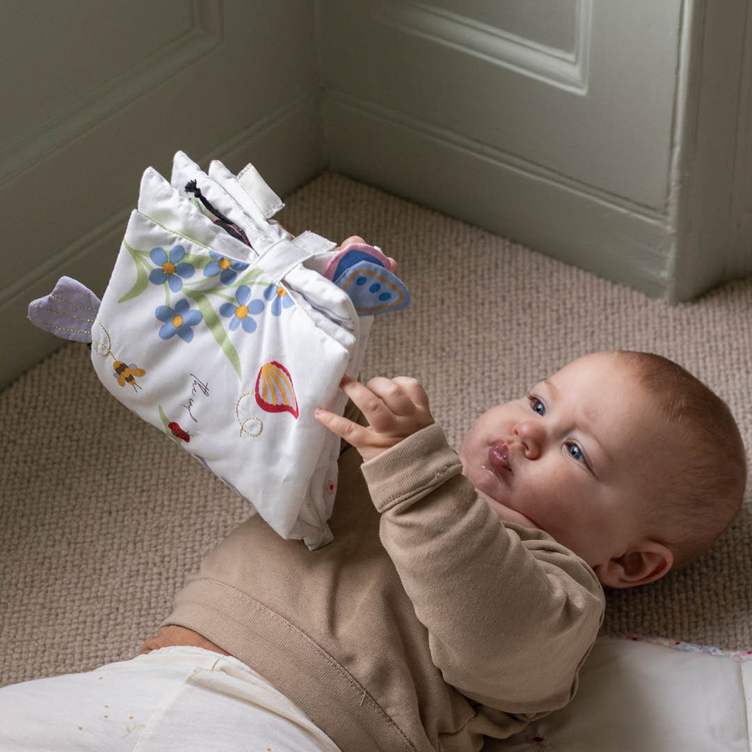 Organic cotton baby sensory fabric book with floral garden design