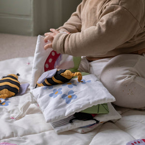 Wildflower Garden baby book with crinkle and peekaboo features