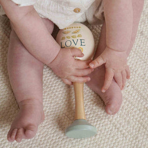 Wooden musical toy set with floral-inspired detailing