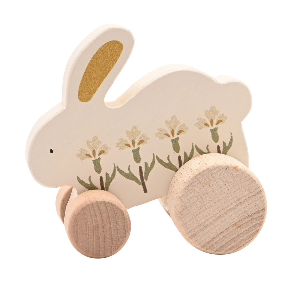Close view of the wooden rabbit’s yellow inner ear, floral decoration and natural wood wheels.