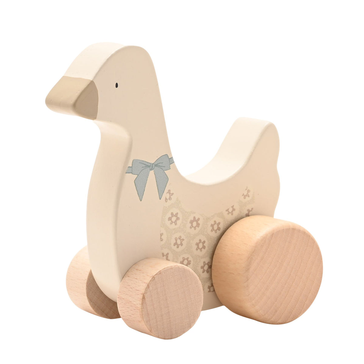 Angled view of a cream wooden goose showing its sage bow, floral body and four wooden wheels.