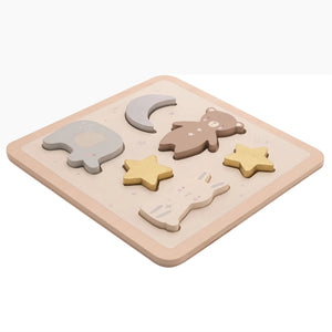 Close-up of wooden puzzle baby toy showing smooth edges and softly painted animal pieces