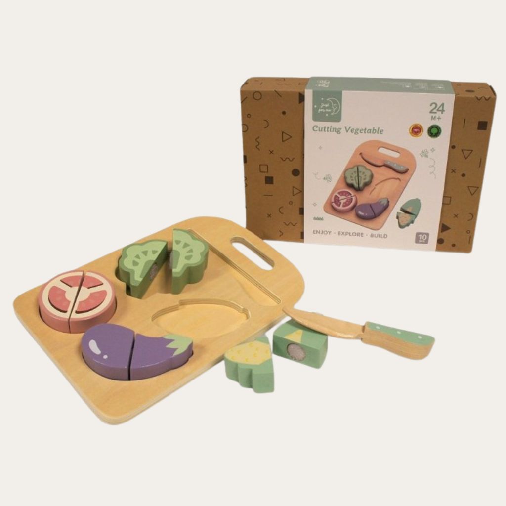 Wooden toy for toddlers cutting board with colorful vegetable shapes and packaging in the background.