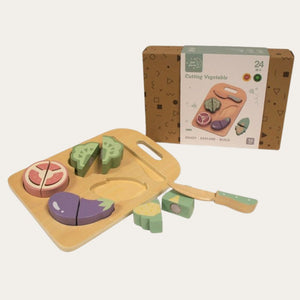 Wooden toy for toddlers cutting board with colorful vegetable shapes and packaging in the background.