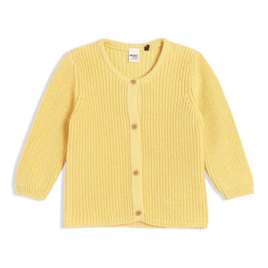 Yellow baby cardigan from a clothes set.