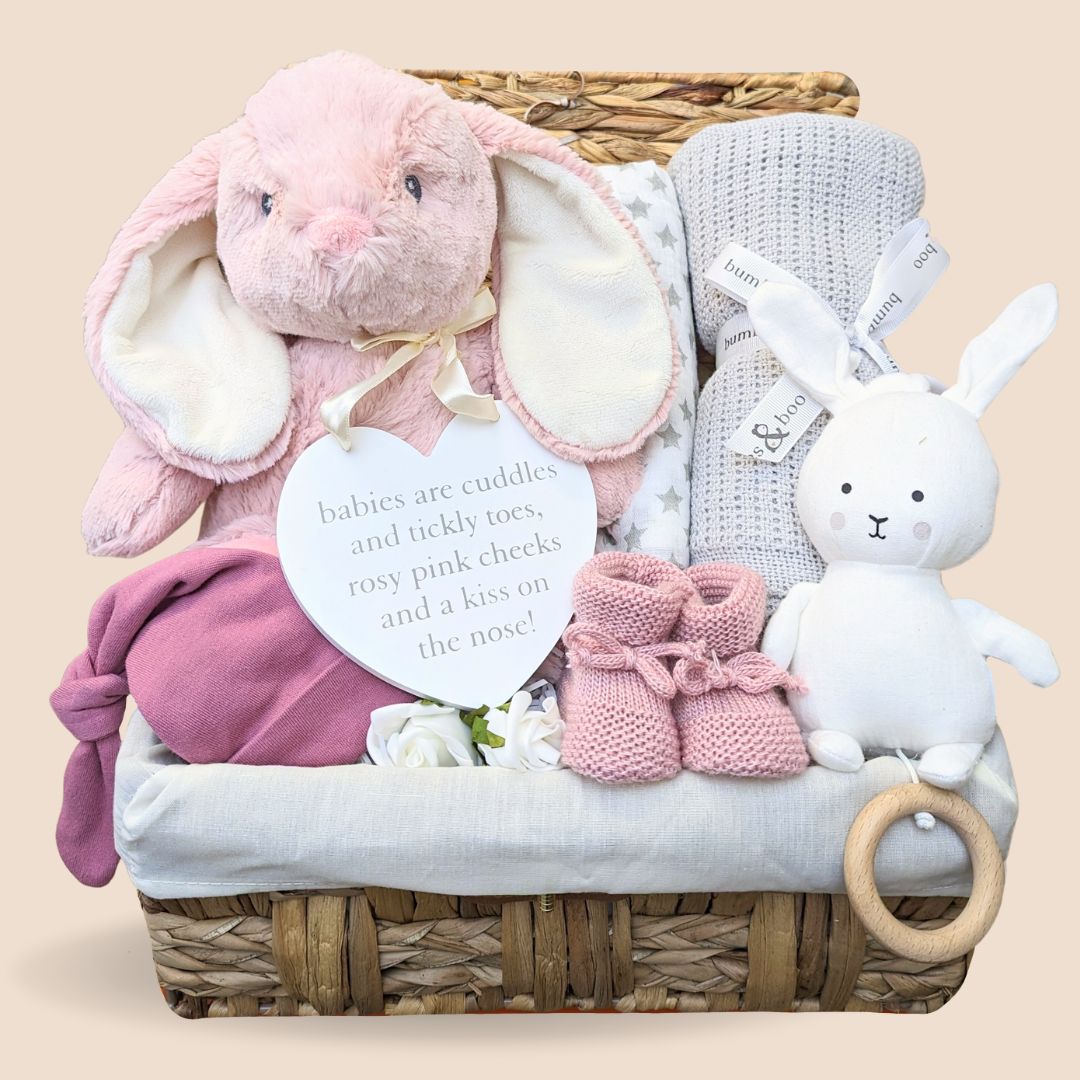 baby girl gifts hamper with pink bunny.
