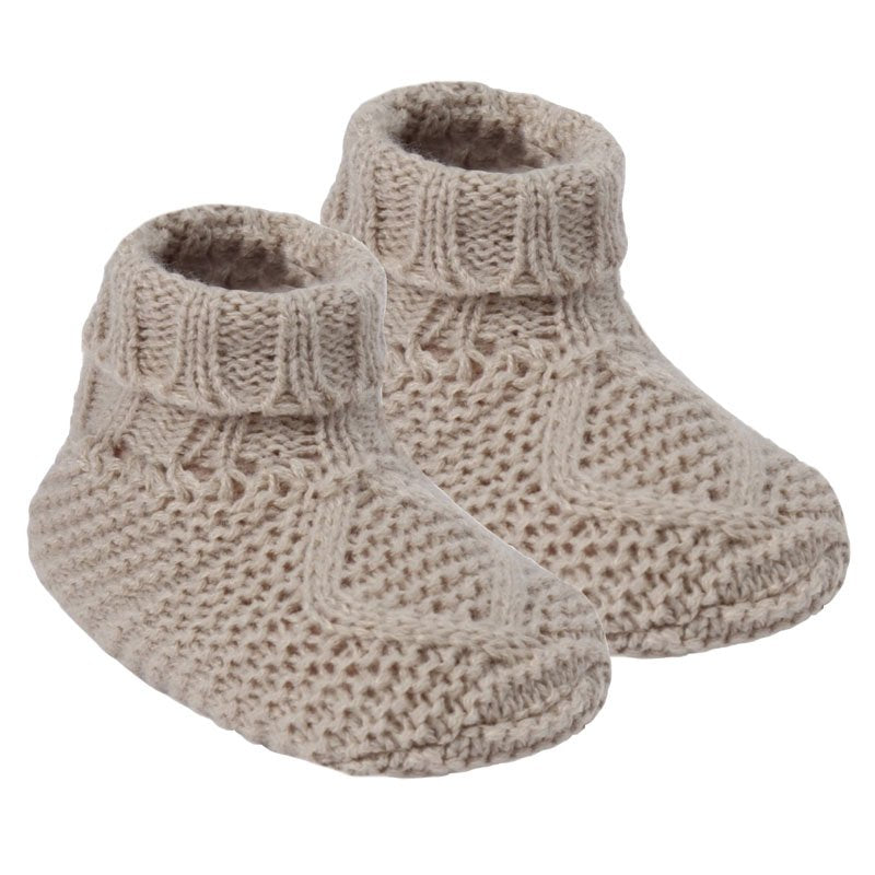 Baby booties in a beige / biscuit colour chain knit.