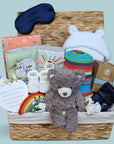 New mum hamper gifts basket, with pamper treats for mum and gifts for the new baby. 