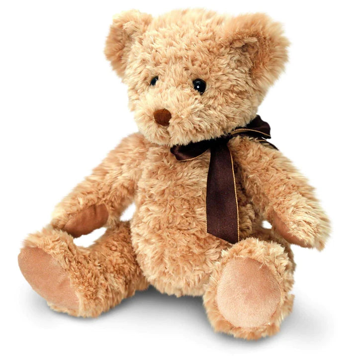 Teddy bear in a classic style, soft tan. This toy bear is sitting wearing a brown ribbon.