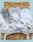 Unisex baby hamper basket with giraffe and elephant theme. Includes bath robe, blanket, personalised soft toy, milestone cards, muslin wrap and more.
