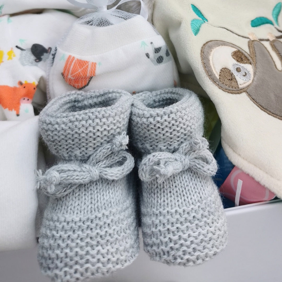 Grey knit baby booties.