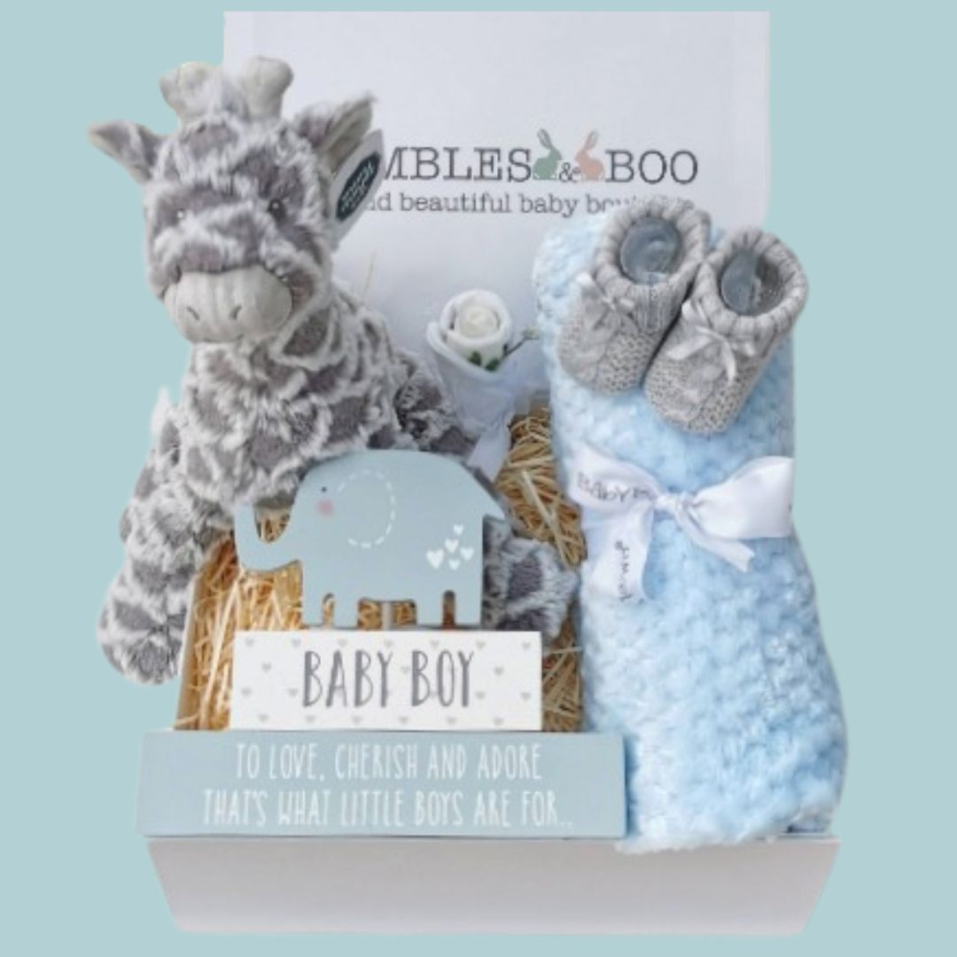 baby boy hamper gifts with giraffe, blanket, baby booties and mittens.