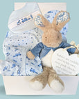 baby boy hamper box with peter rabbit soft toy, clothing set and nursery plaque.