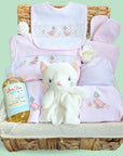 baby girl hamper gift with clothing set, knit toy and baby bubbles..