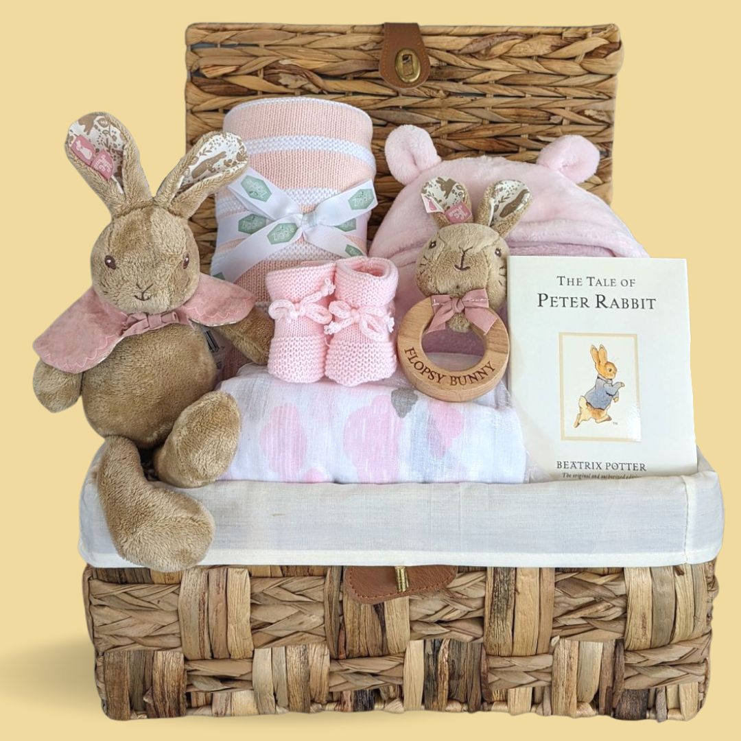 Baby girl gift hamper in pink with Peter Rabbit theme.