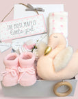 Baby girl hamper gift with organic swan soft toy, baby booties, hanging data plaque and muslin wrap.