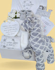 New baby gift box with elephant themed baby clothing set, giraffe soft toy and  baby booties.
