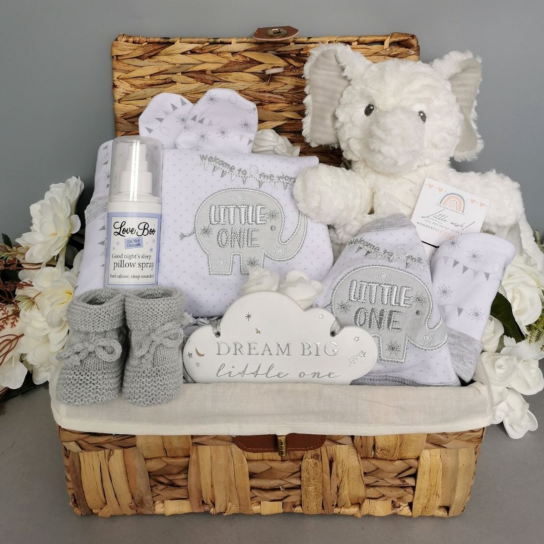 Baby hamper basket gift with clothing set and elephant teddy. Also included baby booties, baby nursery plaque and bracelet for Mum.