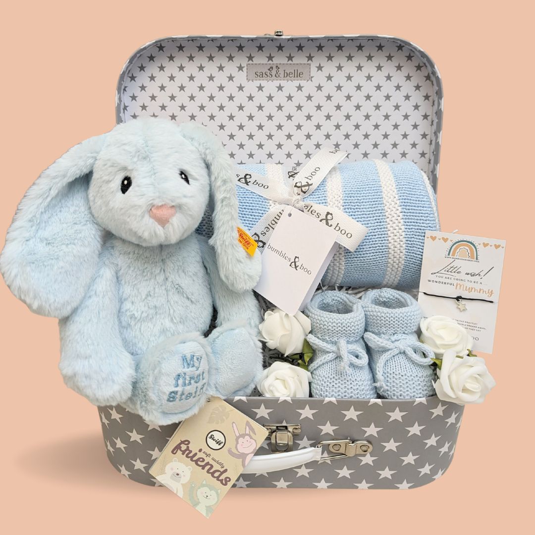 baby boy hamper gift with steiff bunny rabbit, blanket and baby booties.