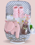 baby shower gifts hamper with organic elephant, baby booties, muslin wrap, mittens and chocolate for mum.