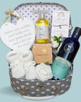 Baby shower gift hamper contains treats for mum along with gifts for the new baby. Award winning massage oil, beauty sleep bubbles and chocolates.