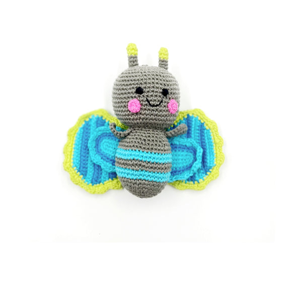 Handmade organic blue butterfly rattle toy with a smiling face and colorful wings.