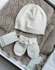 Beautiful cashmere white knitted hat and mitten set.  The perfect gift for a new baby
