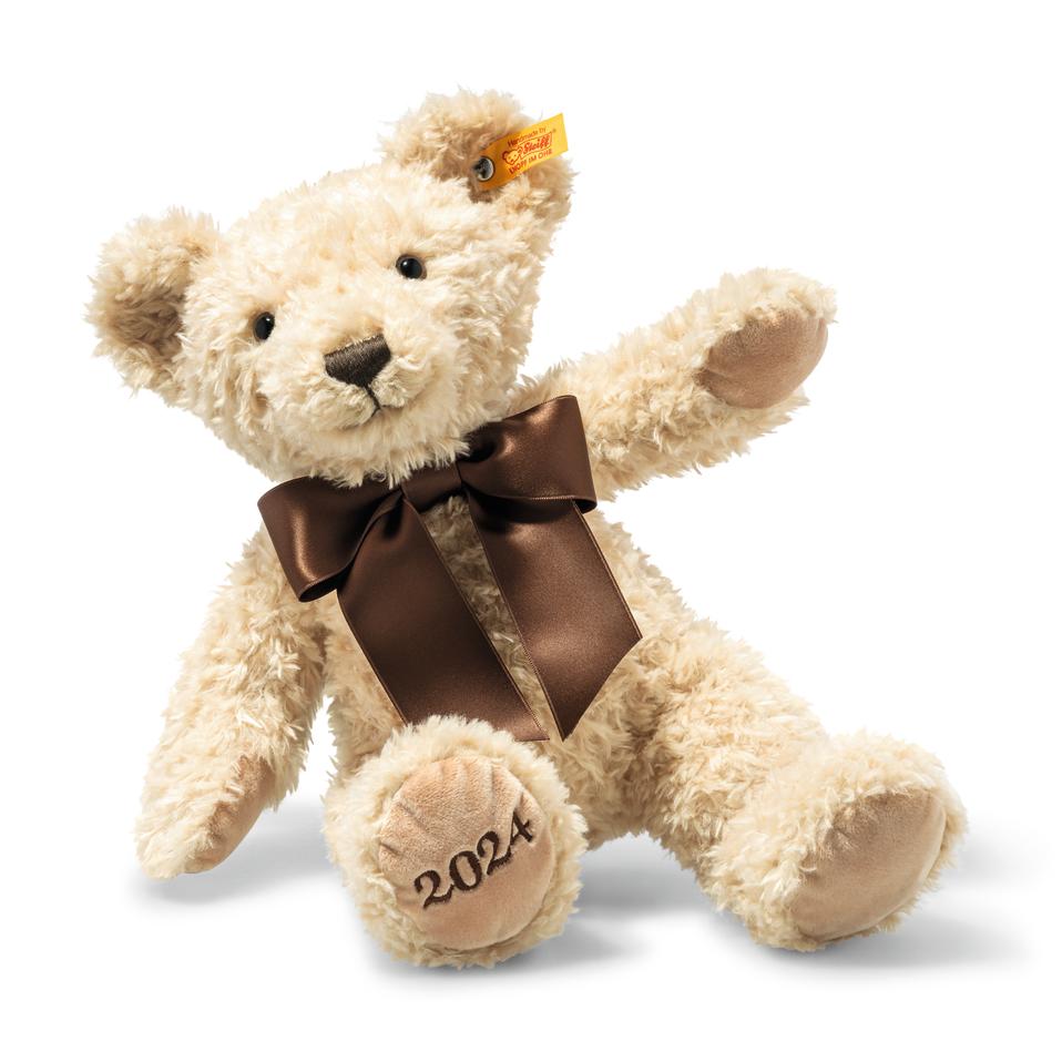 Soft 2024 year teddy bear from steiff with 2024 embroidered on the foot and a brown satin bow