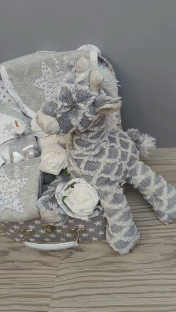 Baby hamper gift with giraffe soft toy, baby clothing set and chocolates for the parents.