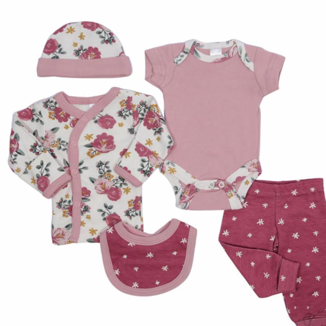 Early baby clothing set with pink flowers.